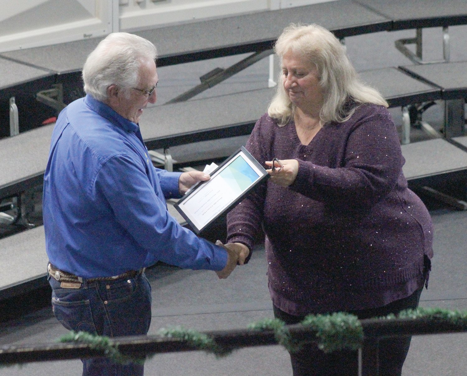 A Certificate of Appreciation is given to the Hartville Lions Club.